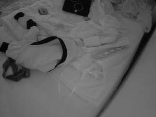 voyeurcam-julmodels-whitebed-1 webcam model stream image