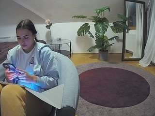 voyeurcam-julmodels-whitebed-6 webcam model stream image