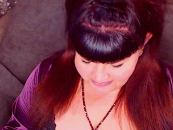 RedBustyX webcam model stream image